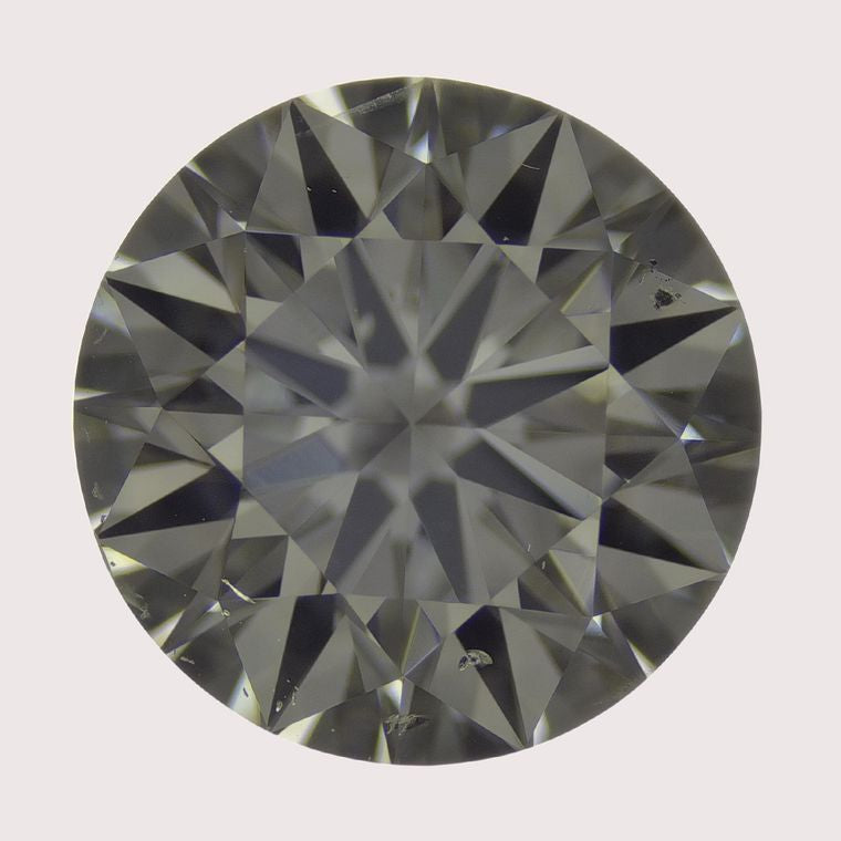Round, 0.82 Ct, M, SI2, Good Cut Diamond
